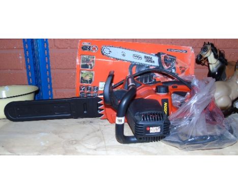 A Black And Decker Electric Chainsaw (Never Used According To Owner).