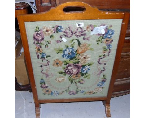 A 20th Century Timber and Glazed Fire Screen with Tapestry Panel.