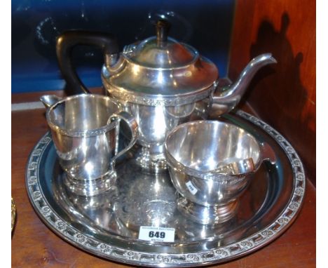 A Sheffield Silver-Plated Tea Service with sugar and cream on a circular tray, c. 1930's.