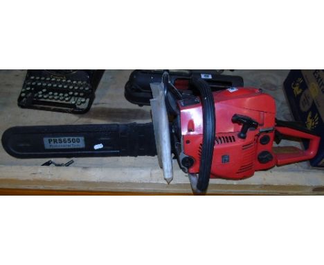 A German Petrol Chainsaw, with instructions.