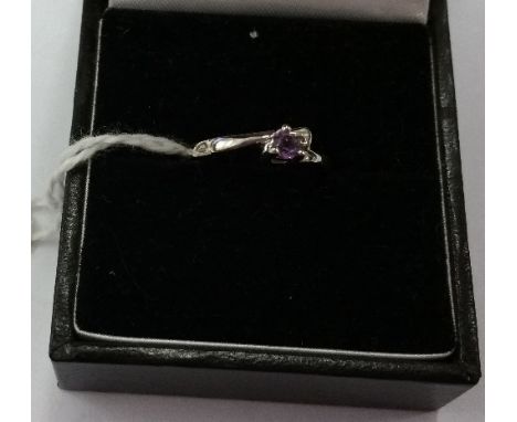 A Silver and Gem Set Ring. Size L