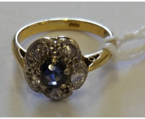 An 18ct Antique Diamond Sapphire Ring.