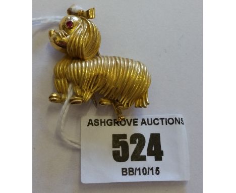 An 18ct Ruby Set Dog Brooch.