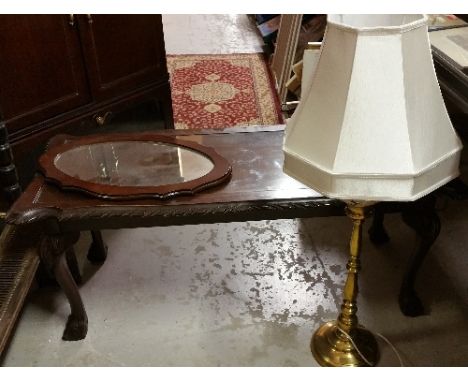 A Mahogany Rectangular Coffee Table, with a mirror and brass table lamp with painted ceramic decoration (3). 
