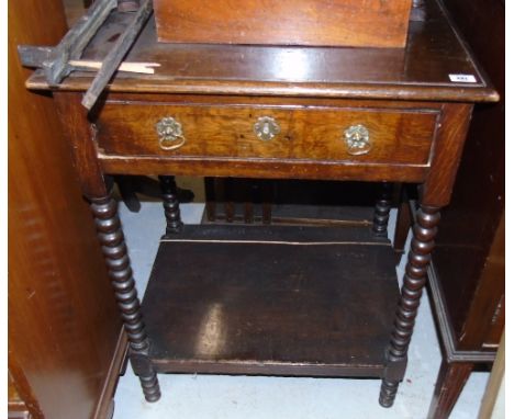 An Oak Side Cabinet; composed from a small Georgian hanging cabinet to the upper section, with shaped and fielded panelled do