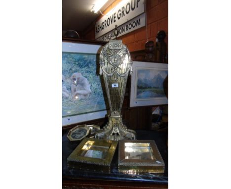 A Late 19th Early 20th Century 'Peacock' Brass Fire Screen, and A Pair of Brass Framed Mirrors, having a punched design to th