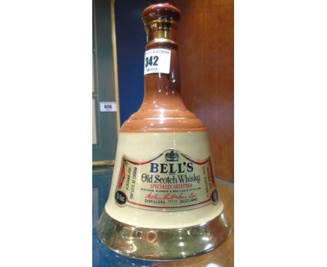 A Wade Bell Decanter, Half Size.