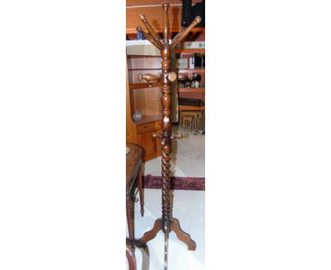 A 20th Century Mahogany Multi Branch Hat & Coat Stand on Spiral Column & Quadraphite Base.