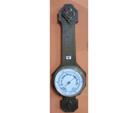 An Early 20th Century English Oak Cased Aneroid Barometer.