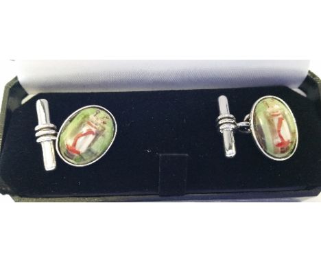 A Pair Of Silver Enamel Golfing Cufflinks.