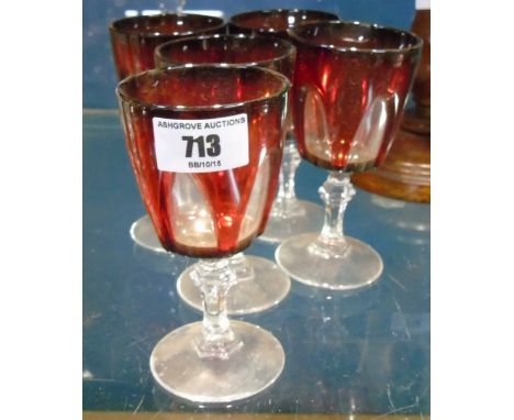 A Set of Five Ruby Wine Glasses..