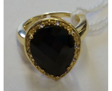 A Silver Gilt Sapphire Cluster Ring.