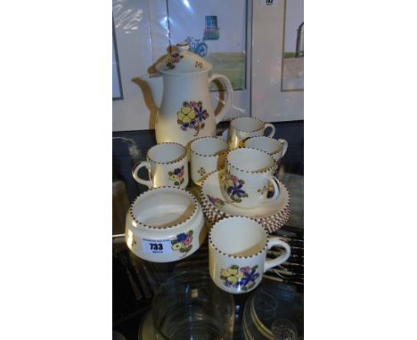 A Honiton Pottery Coffee Service with coffee pot and six cups and saucers.