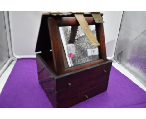 A wooden three tier jewellery box of concertina form