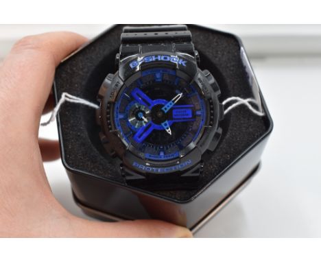 A gents Casio G Shock wrist watch, no: 5146, GA-110LPA, with case, box and instruction card