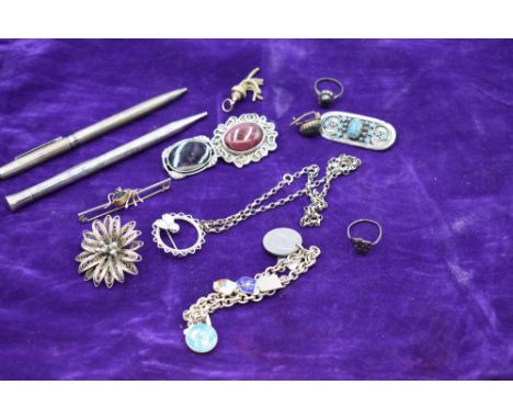 A selection of white metal jewellery including Blue John brooch, filligree brooch, belcher chain, shield bracelet, spider bro