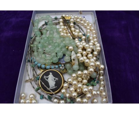 A selection of costume jewellery including Wedgwood pendant, simulated pearls, jadeite style beads, etc