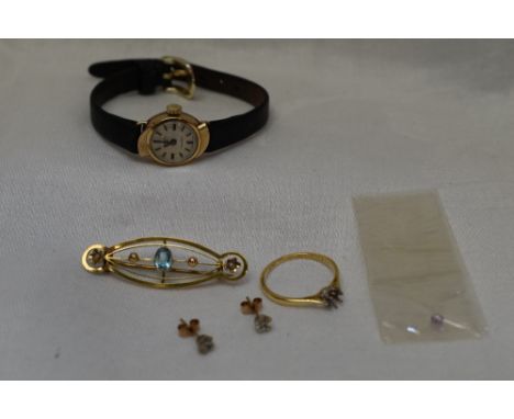 A selection of 9ct gold and yellow metal jewellery including a dress ring loop, marks worn but probably 18ct, a lady's 9ct go