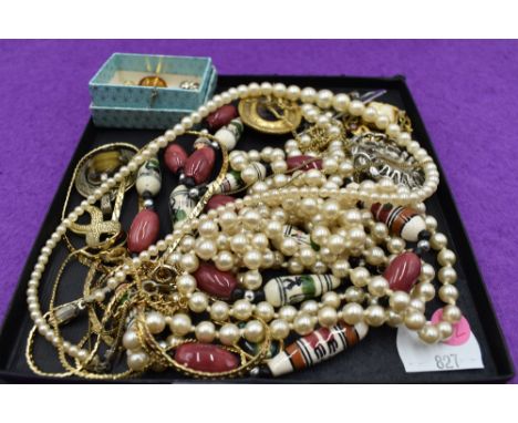 A small selection of costume jewellery including pendants, pearls, brooches etc