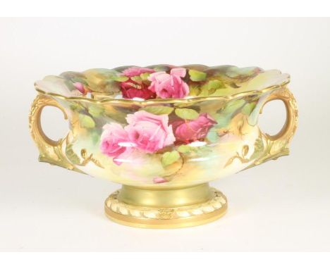 A ROYAL WORCESTER CHINA ROSE BOWL, 1912, of squat baluster form with everted scalloped rim, two naturalistic twig moulded han