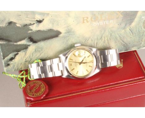 A GENTLEMAN'S STAINLESS STEEL ROLEX OYSTER PERPETUAL DATE CHRONOMETER, 1970's, the circular gilt dial with applied gilt metal