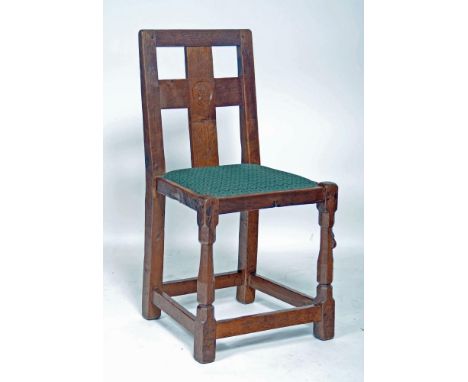 AN ADZED OAK SIDE CHAIR by Robert Thompson, 1930's/40's, the tapering back with straight top rail, cruciform splat centred by
