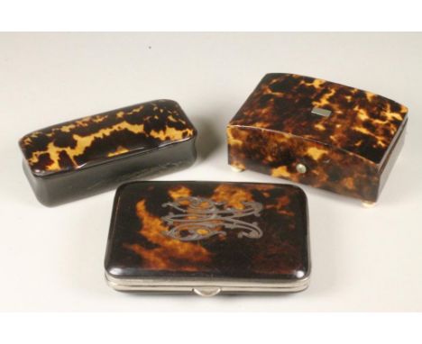 A MID VICTORIAN TORTOISESHELL CARD CASE of rounded oblong form, the fascia inlaid with a monogram and hinged and opening to r