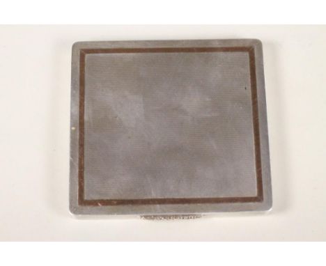 A SILVER CIGARETTE CASE, maker's mark indistinct, Birmingham 1954, of plain square form with engine turning enclosing a plain