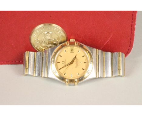 A GENTLEMAN'S "OMEGA" AUTOMATIC CONSTELLATION CHRONOMETER, the gold coloured dial with applied gilt metal line batons, with d