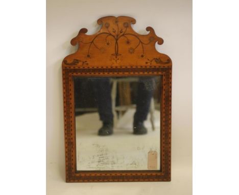 A DUTCH SATINWOOD FRET PIER GLASS, 19th century, the arched and scrolled crest inlaid with a vase of flowers and a pair of co