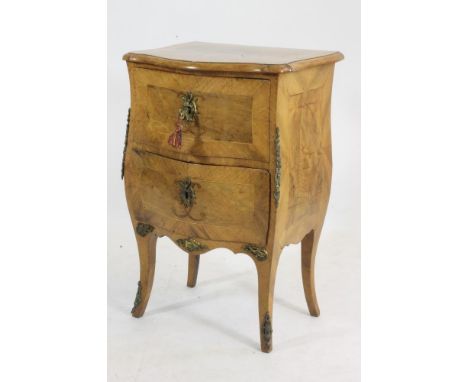 A WALNUT PETITE COMMODE, French/Flemish 19th Century, in the Louis XV style, of serpentine bombe form with figured inlaid pan