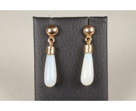 A PAIR OF POLISHED OPAL EAR BOBS on plain studs and posts, unmarked