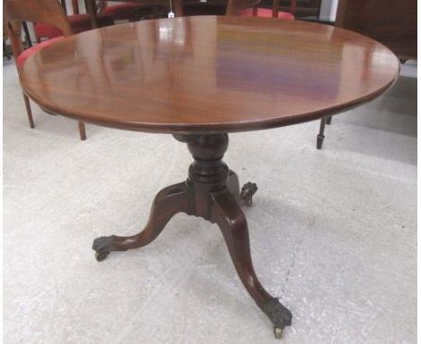 A GEORGIAN MAHOGANY TRIPOD TABLE, c.1800, the circular tip up top on baluster turned stem, the base with cabriole legs and br