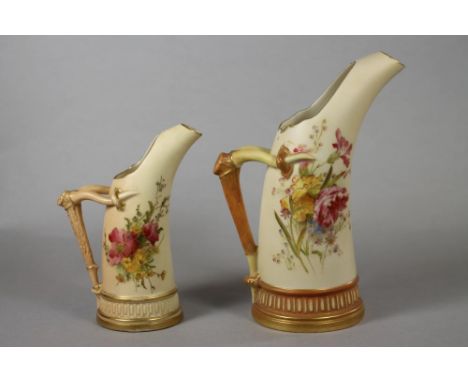 TWO GRADUATED ROYAL WORCESTER CHINA "TUSK" JUGS, 1901 and 1908, painted in colours with loose posies on a blush ivory ground,