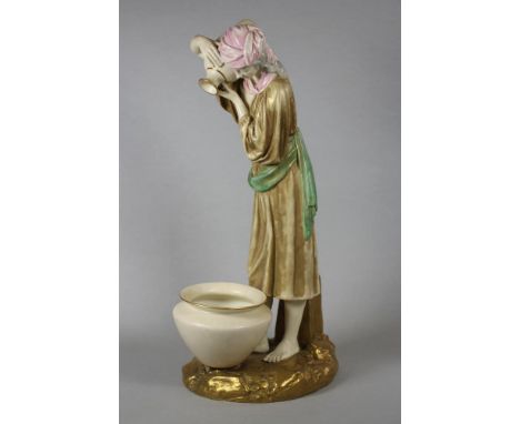 A ROYAL WORCESTER CHINA FIGURE, 1884, modelled by James Hadley as a female Eastern water carrier, in "Patent Metallic" colour