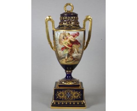 A VIENNA PORCELAIN GARNITURE VASE AND COVER, late 19th century, the high domed pierced cover with open wreath finial, the sle