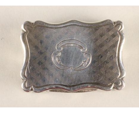 AN EARLY VICTORIAN SILVER VINAIGRETTE, maker Edward Smith, Birmingham 1846, of shaped oblong form with engine turned "tartan"