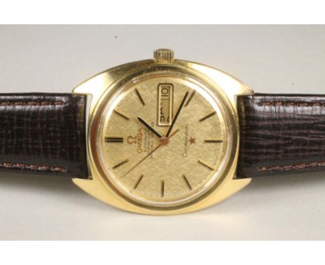 A GENTLEMAN'S 18CT GOLD OMEGA CONSTELLATION AUTOMATIC CHRONOMETER, the brushed gilt dial with applied line batons enclosing d