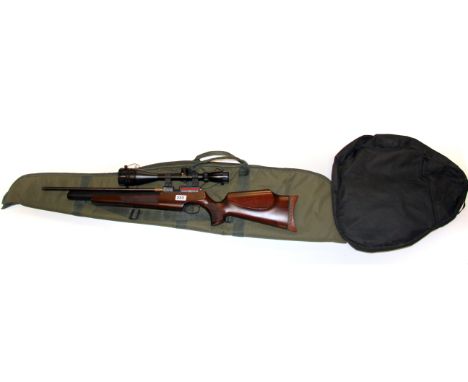 A Logun Solo air rifle&nbsp;(0.177 callibre) with telescopic sight and carrying case together with a cushion rest bag.