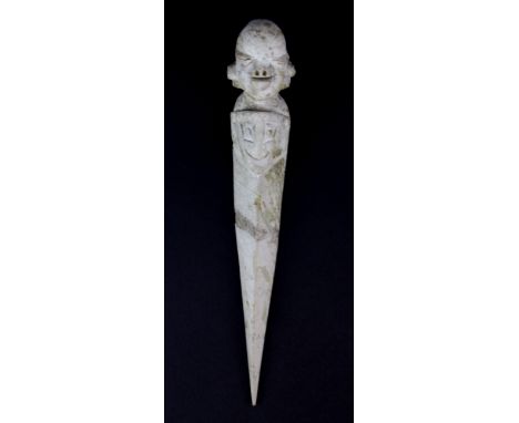 A Chinese archaic form carved jade ritual dagger, L. 22cm.