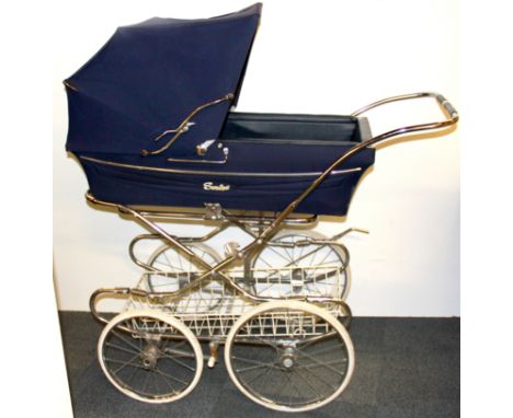 A vintage Swallow baby's pram.