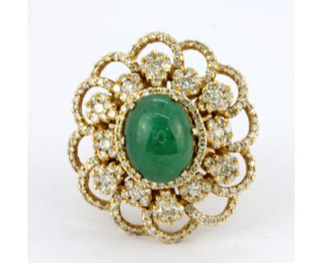 An 18ct yellow gold (worn stamp 18k) ring set with a cabochon cut jade and diamonds, 3.5 x 3cm, (N).