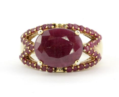 A 925 silver gilt ruby set ring, (M).