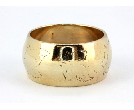 A 9ct yellow gold wedding band, (K) W. 5.7g.&nbsp;