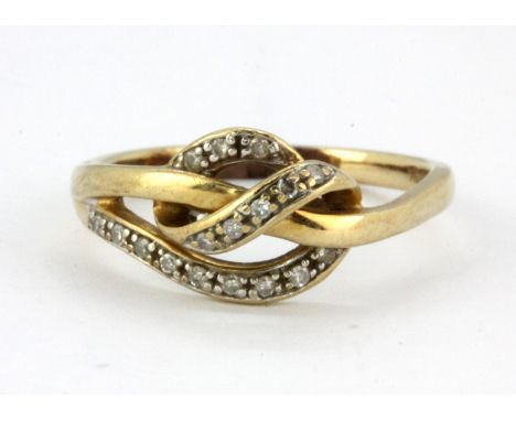 A 9ct yellow gold diamond set ring, (K).