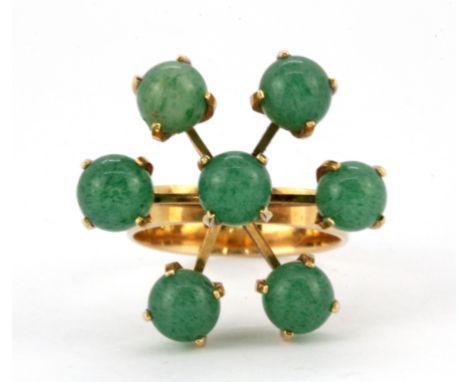 A 14ct yellow gold jade set ring, dia 2.4cm.