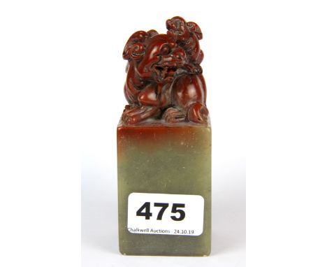 A mid 20th century Chinese carved soapstone seal, H. 12cm.