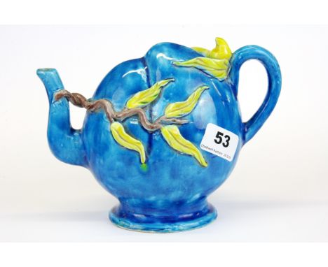A Chinese glazed peach shaped mystery teapot, H. 14cm.