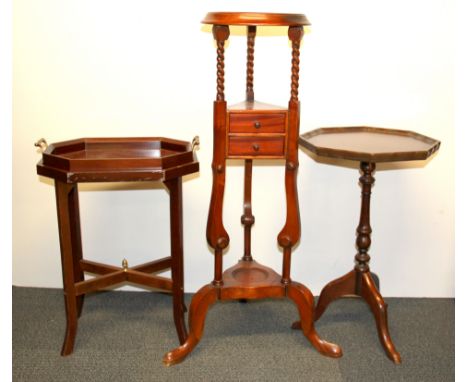 Two wine tables and a small plant stand.