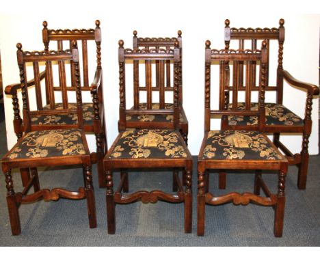 A set of six vintage oak dining chairs with barley twist decoration.
